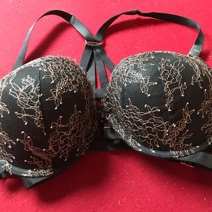 Victoria’s Secret 34DD black with gold embroidery never worn with tag